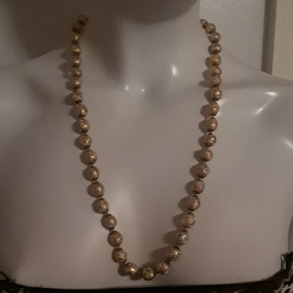 Vintage necklace in gold with blue and pink.